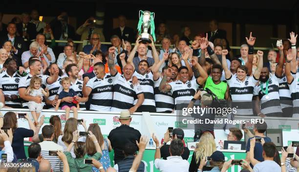 The Barbarian team celebrate victory with the trophy after the Quilter Cup match between England and Barbarians at Twickenham Stadium on May 27, 2018...