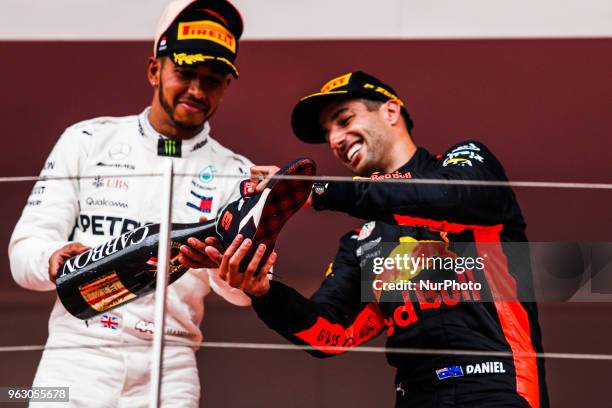 Lewis Hamilton from Great Britain Mercedes W09 Hybrid EQ Power+ team Mercedes GP helping the winner 03 Daniel Ricciardo from Australia with Aston...