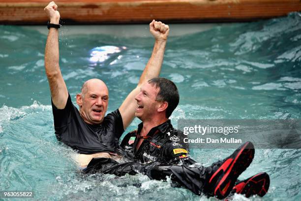 Red Bull Racing Team Principal Christian Horner and Adrian Newey, the Chief Technical Officer of Red Bull Racing celebrate the race win of Daniel...