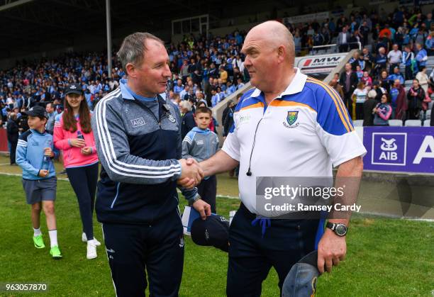 Laois , Ireland - 27 May 2018; Dublin manager Jim Gavin shakes hands with Wicklow manager John Evans, right, following the Leinster GAA Football...