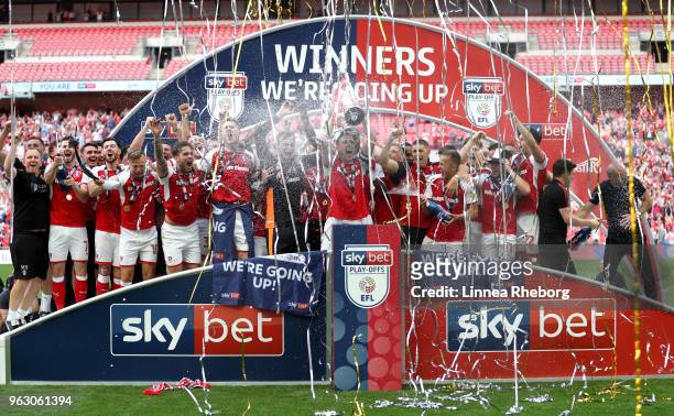 Rotherham United players celebrate victory with the trophy after the Sky Bet League One Play Off Final between Rotherham United and Shrewsbury Town...