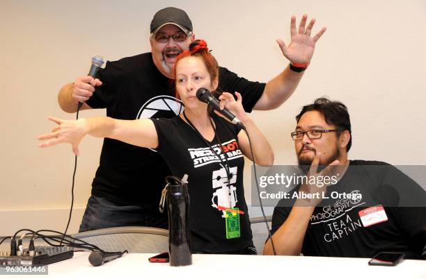 Cosplay photographers James Rulison, Morgue Anna and Gil Riego Junior attend the Anime Pasadena 2018 Cosplay And Nerd Convention held at Pasadena...