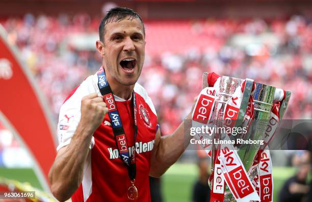 Captain Richard Wood of Rotherham United celebrates victory with the trophy after the Sky Bet League One Play Off Final between Rotherham United and...