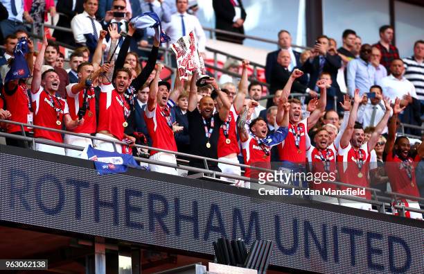Richard Wood of Rotherham United and Paul Warne, Manager of Rotherham United lift the trophy in victory after the Sky Bet League One Play Off Final...