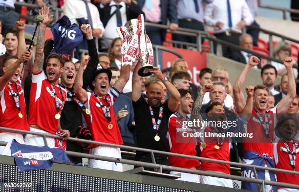 Richard Wood of Rotherham United and Paul Warne, Manager of Rotherham United lift the trophy in victory after the Sky Bet League One Play Off Final...