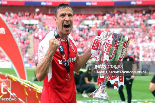 Rotherham captain and goalscorer Richard Wood poses with the trophy during the Sky Bet League One Play Off Semi Final:Second Leg between Rotherham...