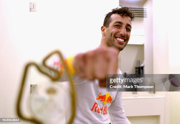Race winner Daniel Ricciardo of Australia and Red Bull Racing with his trophy in his changing room after the Monaco Formula One Grand Prix at Circuit...