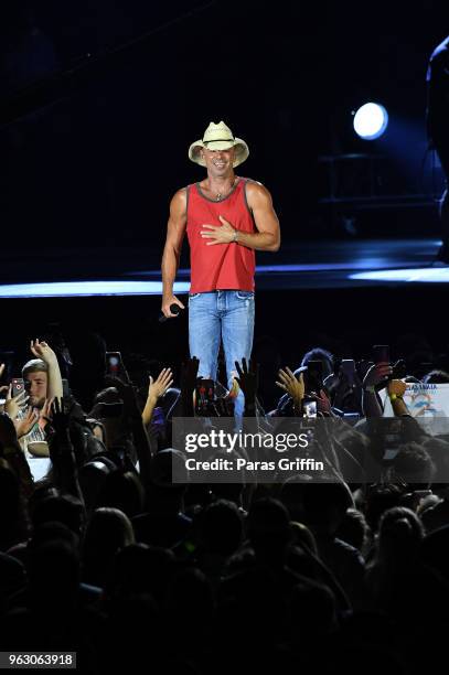 Kenny Chesney performs in concert during "Trip Around The Sun" tour at Mercedes-Benz Stadium on May 26, 2018 in Atlanta, Georgia.