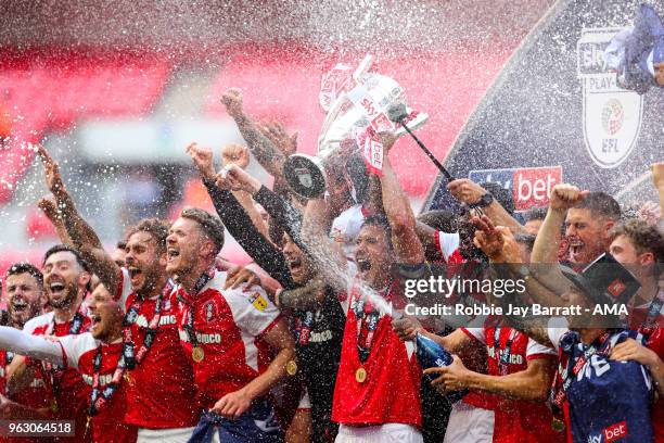 Rotherham United celebrate by lifting the EFl Sky Bet Championship League One play off trophy during the Sky Bet League One Play Off Final between...