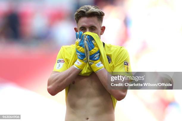 Dejected Shrewsbury goalkeeper Dean Henderson holds his head in his hands during the Sky Bet League One Play Off Semi Final:Second Leg between...