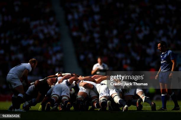 England and Barbarians players in a scrum during the Quilter Cup match between England and Barbarians at Twickenham Stadium on May 27, 2018 in...