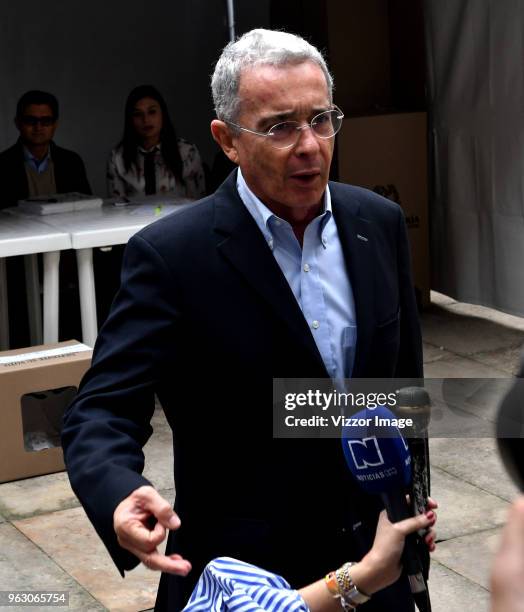 Former President of Colombia Álvaro Uribe Vélez speaks to the press during the 2018 Presidential Elections in Colombia on May 27, 2018 in Bogota,...