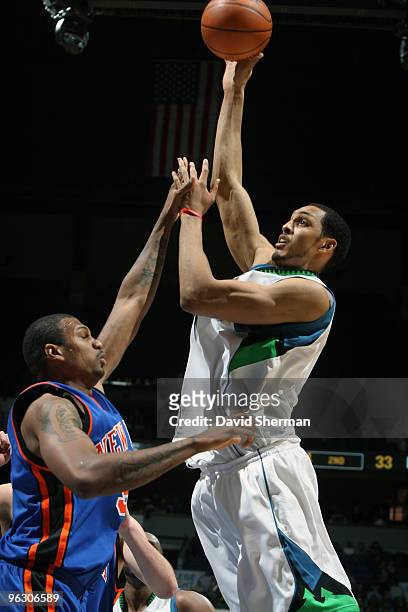 Ryan Hollins of the Minnesota Timberwolves shoots over Jonathan Bender of the New York Knicks during the game on January 31, 2010 at the Target...