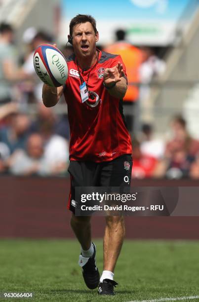 Scott Wisemantel, the England defence coach for the tour of South Africa passes the ball during the Quilter Cup match between England and the...