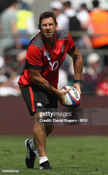 Scott Wisemantel, the England defence coach for the tour of South Africa passes the ball during the Quilter Cup match between England and the...