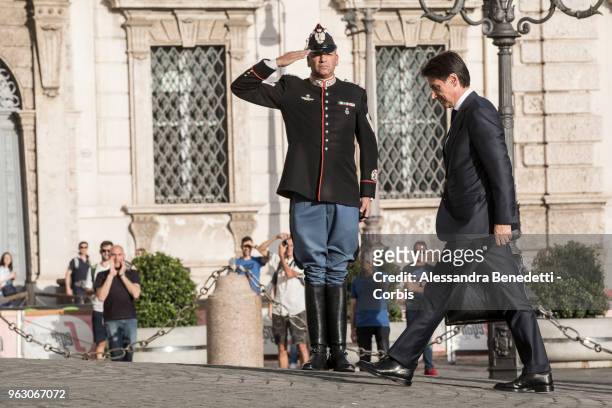 Italy's designated Prime Minister Giuseppe Conte enters the Quirinale Presidential Palace on May 27, 2018 in Rome, Italy. Italy's political stalemate...
