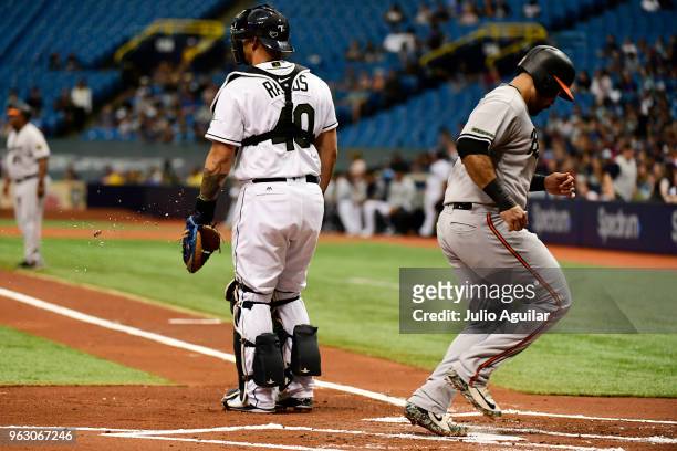 Pedro Alvarez of the Baltimore Orioles scores in the first inning against the Baltimore Orioles on May 27, 2018 at Tropicana Field in St Petersburg,...