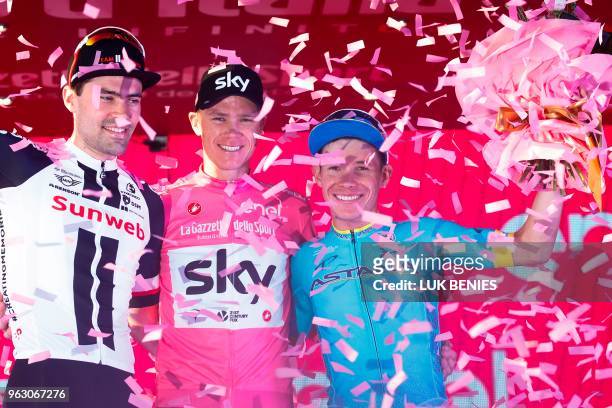 Pink jersey and winner, Britain's rider of team Sky Christopher Froome , poses with 2nd placed, Netherlands' rider of team Sunweb Tom Dumoulin and...
