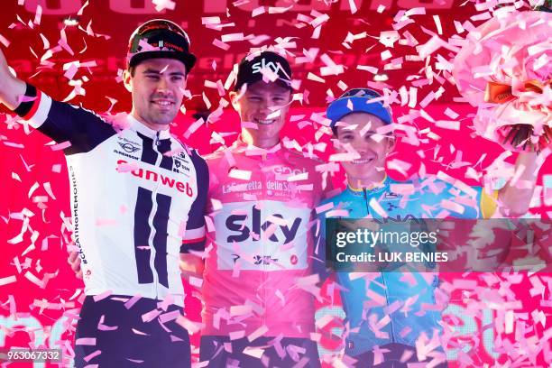 Pink jersey and winner, Britain's rider of team Sky Christopher Froome , poses with 2nd placed, Netherlands' rider of team Sunweb Tom Dumoulin and...