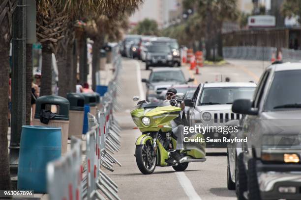 Shaun Boone, of Virginia Beach, turns off N. Ocean Blvd. On May 27, 2018 in Myrtle Beach, South Carolina. Also known as Atlantic Beach Bikefest and...