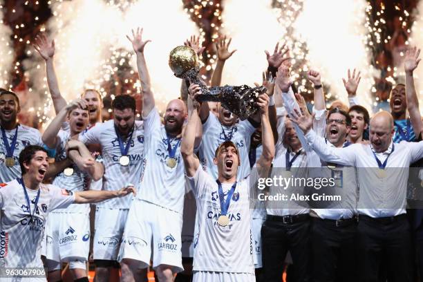 Team captain Michael Guigou of Montpellier lifts the trophy after his team won the EHF Champions League Final 4 Final match between Nantes HBC and...