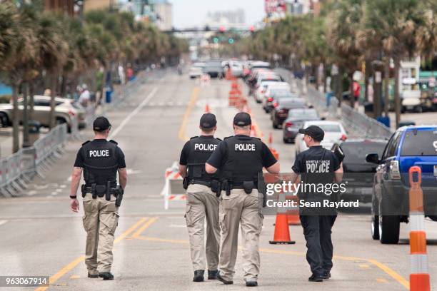 Law enforcement patrol N. Ocean Blvd. On May 27, 2018 in Myrtle Beach, South Carolina. Also known as Atlantic Beach Bikefest and Black Bikers Week,...