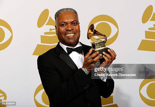Musician Booker T. Jones poses with Best Pop Instrumental Album for 'Potato Hole' in the press room during the 52nd Annual GRAMMY Awards held at...