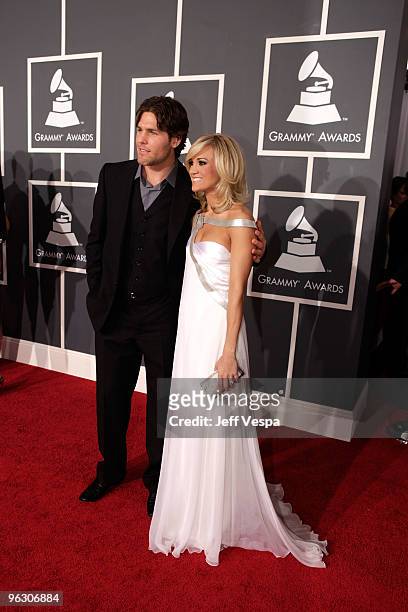 Player Mike Fisher and singer Carrie Underwood arrive at the 52nd Annual GRAMMY Awards held at Staples Center on January 31, 2010 in Los Angeles,...