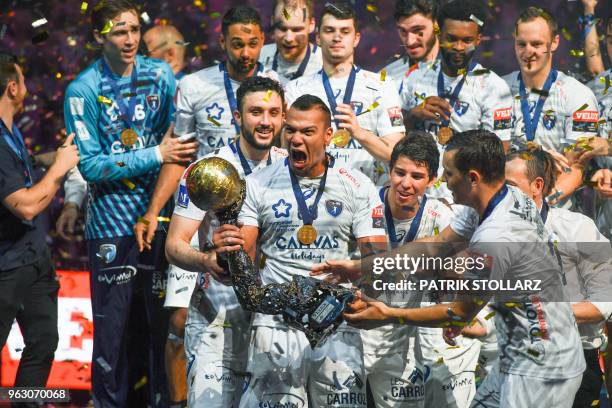 Montpellier's players celebrate with the trophy after winning the Final match HBC Nantes vs HB Montpellier at the EHF Pokal men's Champions League...