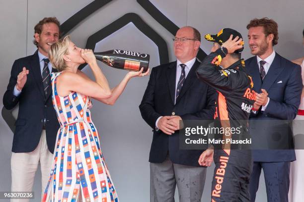 Princess Charlene of Monaco drinks the winner champagne on the podium during the Monaco Formula One Grand Prix at Circuit de Monaco on May 27, 2018...