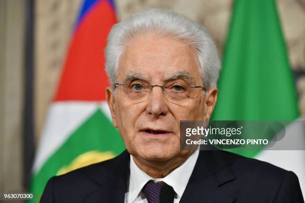 Italy's President Sergio Mattarella addresses journalists after a meeting with Italy's prime ministerial candidate Giuseppe Conte on May 27, 2018 at...
