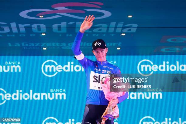 Pink jersey and winner, Britain's rider of team Sky Christopher Froome, celebrates the blue jersey of the "King of the Mountains classification...