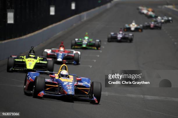 Alexander Rossi, driver of the NAPA Auto Parts Honda leads a pack of cars during the 102nd Running of the Indianapolis 500 at Indianapolis...