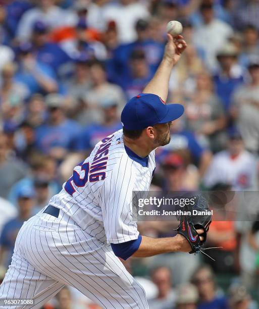 Brian Duensing of the Chicago Cubs pitches against the San Francisco Giants at Wrigley Field on May 25, 2018 in Chicago, Illinois. The Cubs defeated...