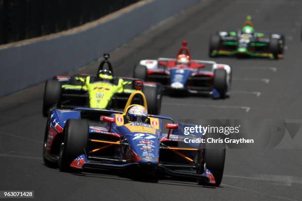 Alexander Rossi, driver of the NAPA Auto Parts Honda leads a pack of cars during the 102nd Running of the Indianapolis 500 at Indianapolis...