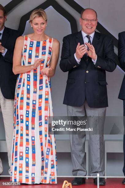 Princess Charlene of Monaco and Prince Albert II of Monaco are seen on the podium at Circuit de Monaco on May 27, 2018 in Monte-Carlo, Monaco.