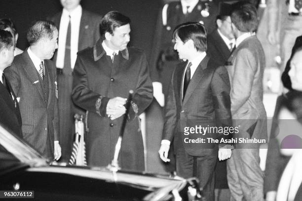 Sultan Hassanal Bolkiah of Brunei Darussalam is welcomed by Crown Prince Naruhito on arrival ahead of the Funeral of late Emperor Hirohito at Haneda...
