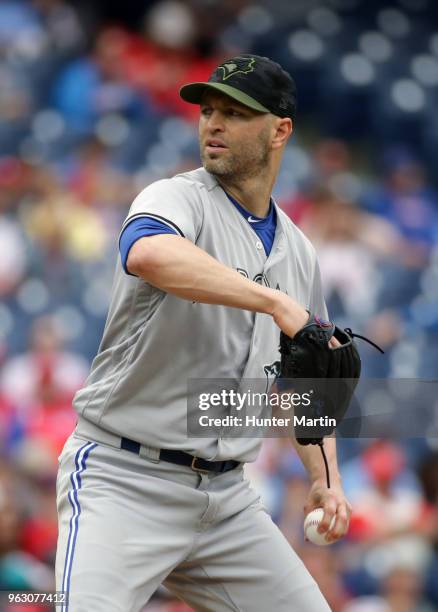 Starting pitcher J.A. Happ of the Toronto Blue Jays throws a pitch in the first inning during a game against the Philadelphia Phillies at Citizens...