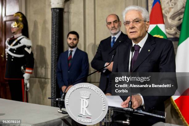 Italy's President Sergio Mattarella talks to journalists after Italy's designated Prime Minister Giuseppe Conte returned the mandate to form a new...