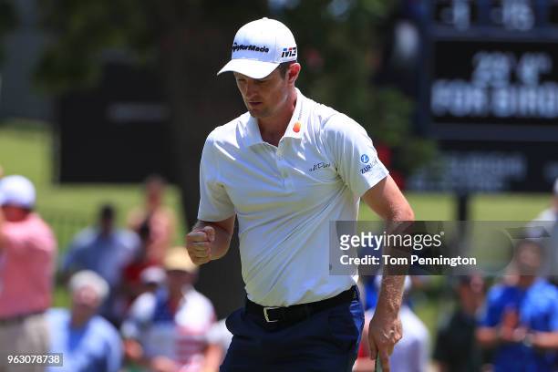 Justin Rose of England reacts after a birdie putt on the fifth green during the final round of the Fort Worth Invitational at Colonial Country Club...