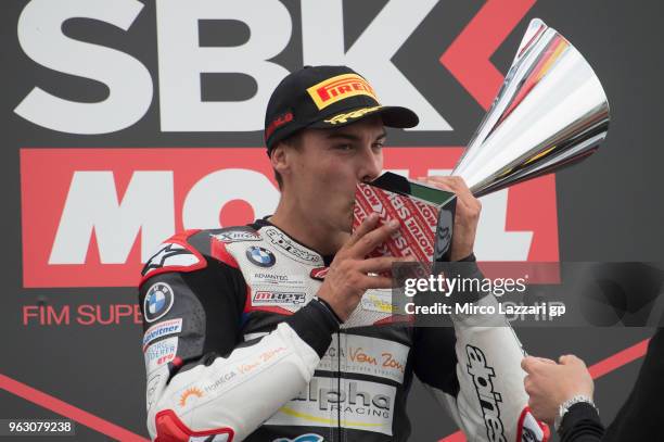 Markus Reiterberger of Germany and Alpha Racing Van Zon BMW celebrates the victory on the podium at the end of the Superstock1000 race during the...