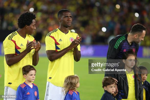 Carlos Sanchez , Cristian Zapata and David Ospina of Colombia pose during a training session open to the public as part of the preparation for FIFA...