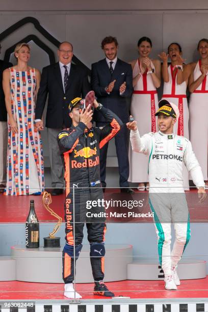 Race winner Daniel Ricciardo of Australia and Red Bull Racing celebrates on the podium at Circuit de Monaco on May 27, 2018 in Monte-Carlo, Monaco.