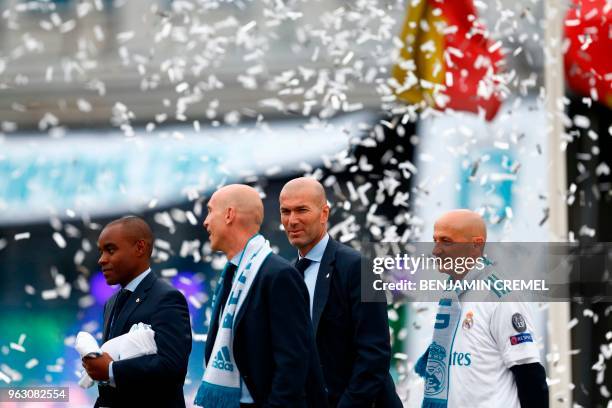 Real Madrid's assistant coaches Amidou Msaidie, assistant coach David Bettoni, Real Madrid's French coach Zinedine Zidane, and Antonio Pintus...