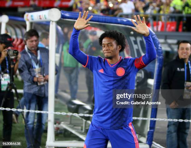 Juan Cuadrado of Colombia greets to the public during a training session open to the public as part of the preparation for FIFA World Cup Russia 2018...