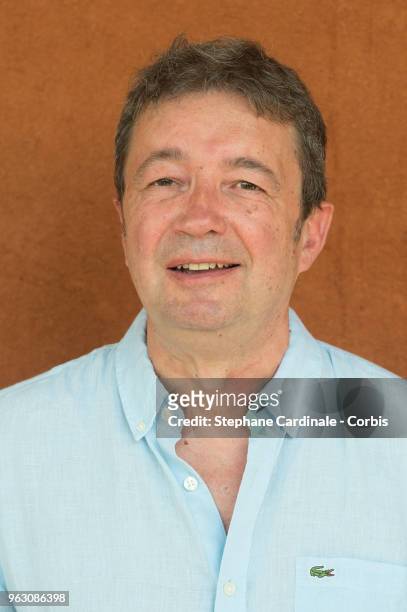 Actor Frederic Bouraly attends the 2018 French Open - Day One at Roland Garros on May 27, 2018 in Paris, France.