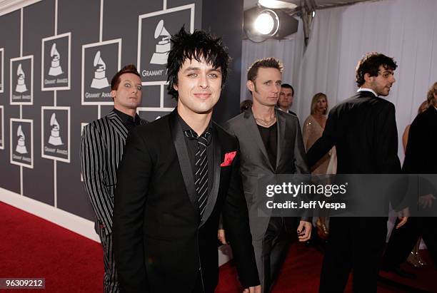 Musicians Tre Cool, Billie Joe Armstrong and Mike Dirnt of Green Day arrive at the 52nd Annual GRAMMY Awards held at Staples Center on January 31,...