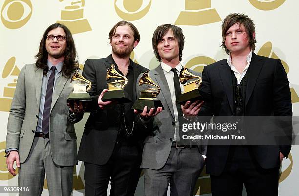 Musicians Nathan Followill, Caleb Followill, Jared Followill and Matthew Followill of Kings Of Leon pose in the press room at the 52nd Annual GRAMMY...