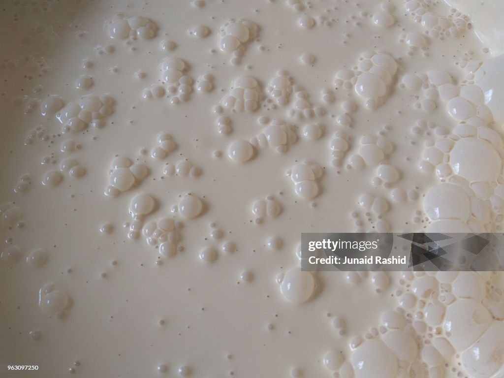 Paint emulsion surface with bubbles