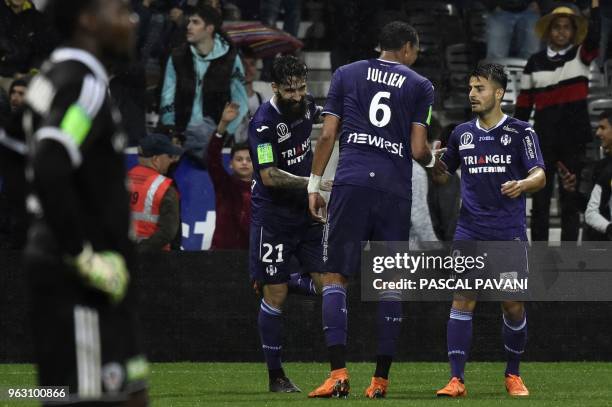 Toulouse's French defender Christopher Jullien , Toulouse's Swedish midfielder Jimmy Durmaz and Toulouse's French forward Corentin Jean celebrate...